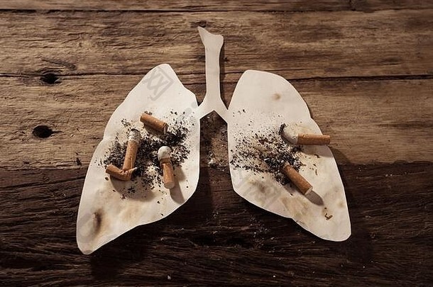 概念上的图像香烟存根燃烧脏肺孤立的乡村背景广告风格烟草肺癌症医疗