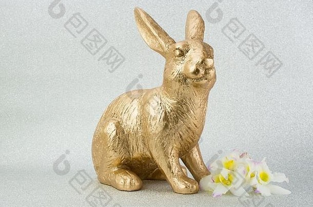 黄金复活节兔子兔子粉红色的背景