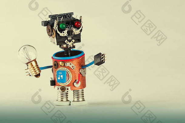 机械机器人光灯泡塑料头彩色的绿色红色的眼睛电线手齿轮齿轮轮时钟部分机制有趣的玩具字符概念梯度背景宏复制空间