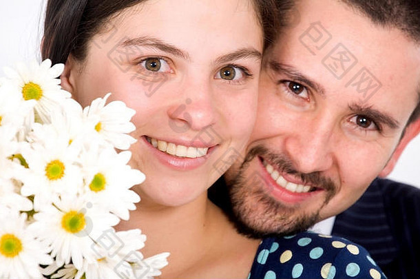美丽的夫妇肖像微笑白色花