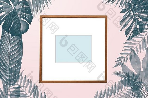 简单的有创意的自然框架使热带棕榈蕨类植物叶子粉红色的柔和的背景前视图