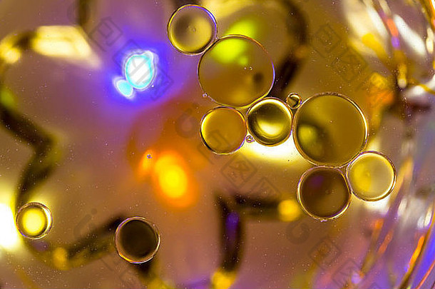 泡沫浮动水颜色照明创建摘要颜色主要是橙色黄色黄金