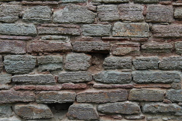 摧毁了时间降水砖墙背景古董砖墙