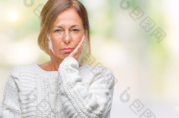 中间年龄高级拉美裔女人穿冬天毛衣孤立的背景思考累了无聊抑郁症问题拉克