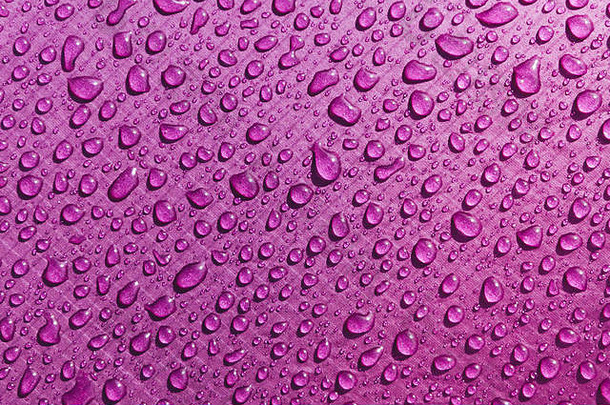 紫色的防水材料把停止布滴水<strong>背景</strong>