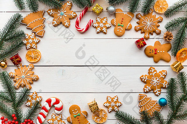 圣诞节饼干糖果节日分支机构冷杉自制的美味的圣诞节姜饼饼干木背景免费的空间