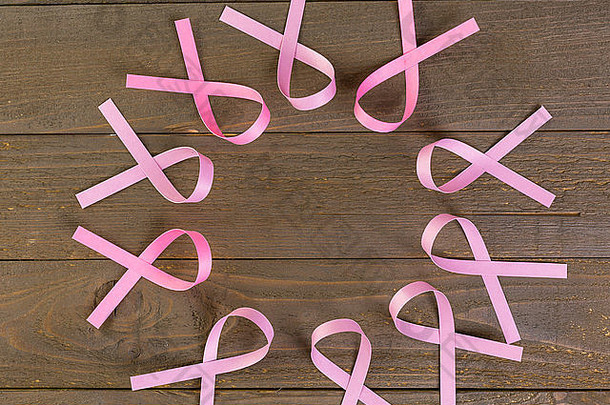 女人的健康象征粉红色的丝带木董事会