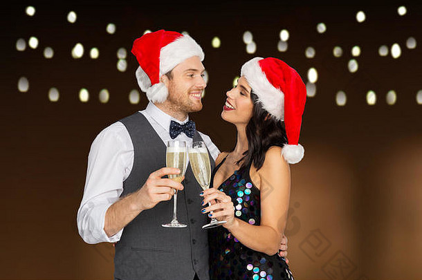 夫妇香槟眼镜圣诞节聚会，派对