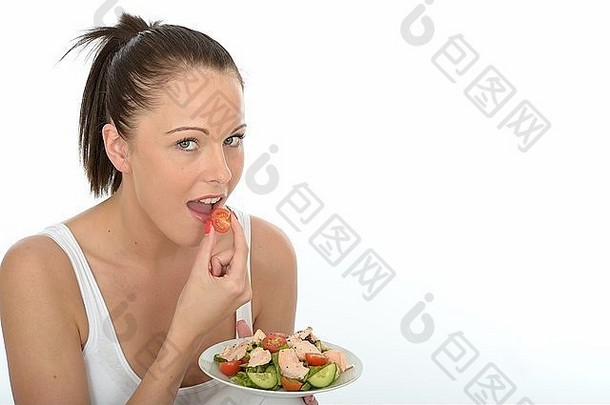 积极的快乐年轻的女人健康的奢侈品餐新鲜挖走大马哈鱼鱼新鲜的混合花园沙拉孤立的白色背景
