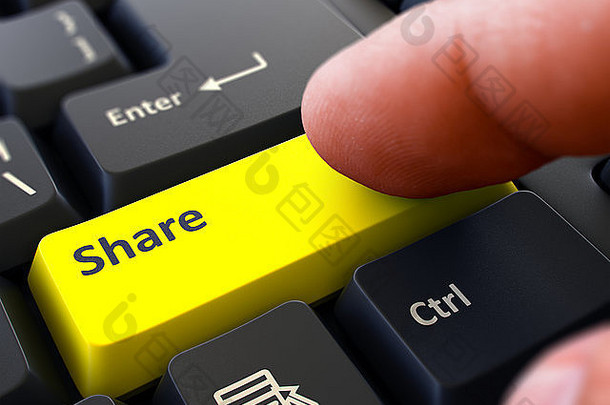分享黄色的按钮手指推按钮黑色的电脑键盘模糊背景特写镜头视图