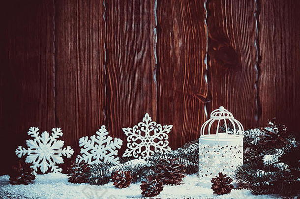 圣诞节灯笼基斯蜡烛圣诞节树分支机构视锥细胞雪花雪古董木背景免费的空间