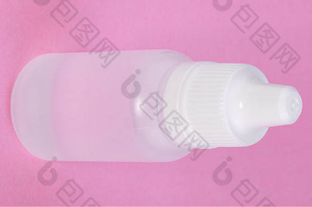 白色塑料瓶粉红色的背景
