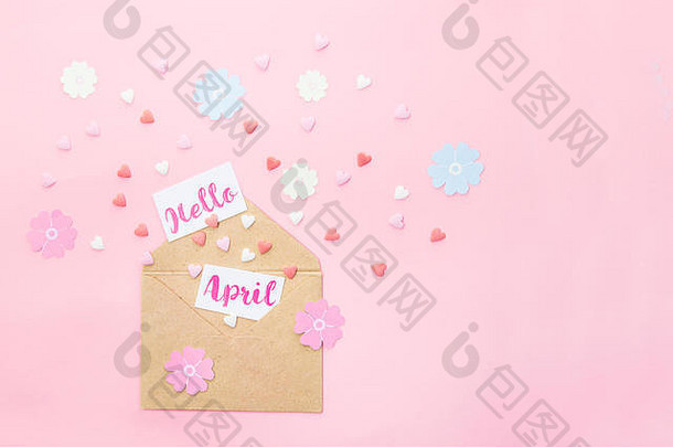 多色糖果糖糖果心手工艺纸花卡片4月刻字飞工艺纸信封粉红色的背景
