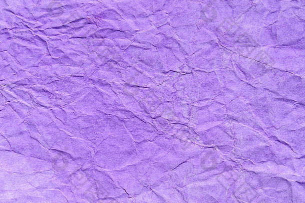 紫罗兰色的颜色有皱纹的柔和的纸背景纹理