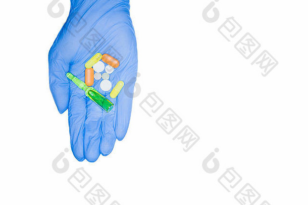 挪用公款医院药物绿色胶囊药片灯泡举行手医疗手套孤立的白色背景