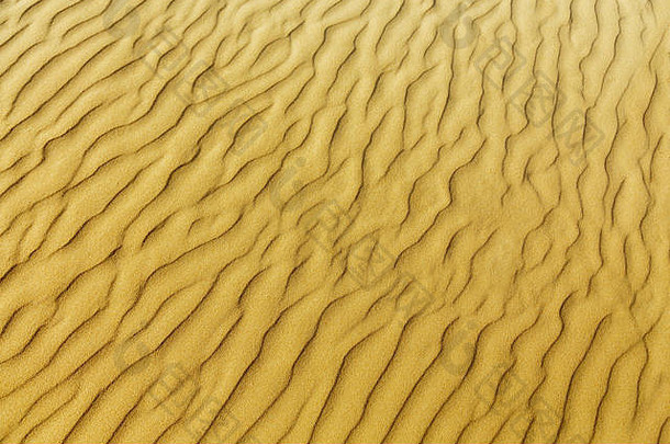 沙子波浪纹理黄色的