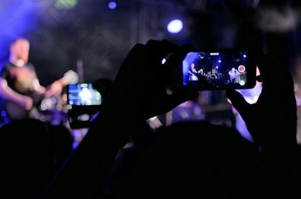 认不出来手轮廓采取照片记录视频生活音乐音乐会智能<strong>手机摄影</strong>娱乐技术