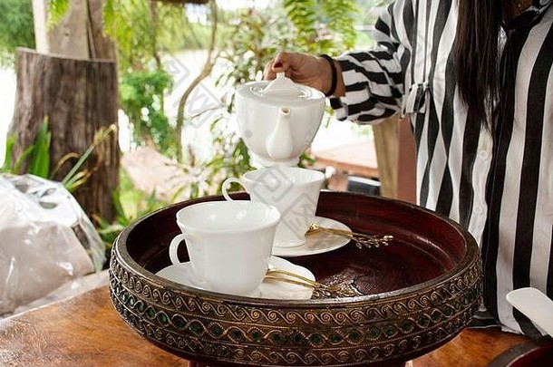 开胃菜茶壶杯集茶时间旅行者客人餐厅阳台户外餐厅度假胜地酒店泰国