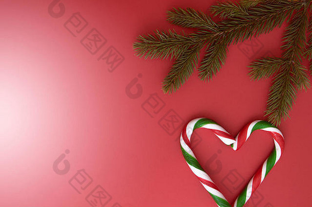 圣诞节背景冷杉树枝糖果拐杖红色的前视图平躺复制空间文本