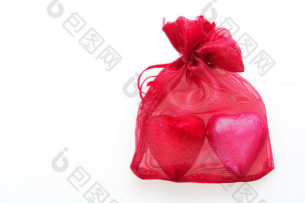 心形状巧克力包装红色的粉红色的箔红色的袋孤立的白色背景情人节一天爱相关的问题