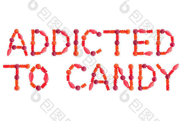 短语上瘾糖果使红色的含糖的糖果孤立的白色背景