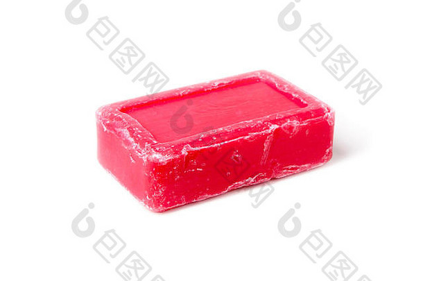 一块粉红色的肥皂关闭孤立的白色