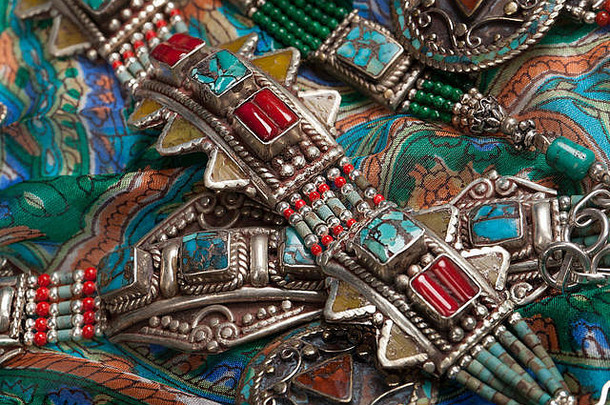 手工制作的珠宝织物背景少数民族风格