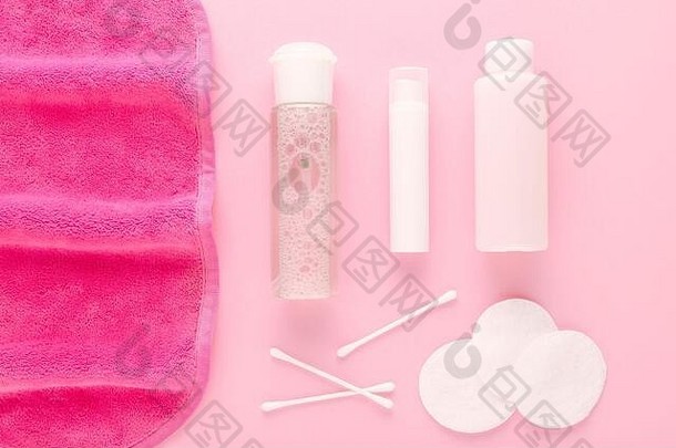 使删除产品胶束水脸清洁布清洗牛奶过来这里棉花垫柔和的粉红色的背景