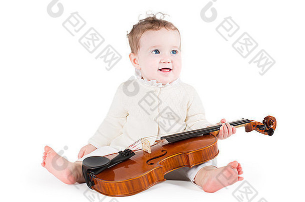 有趣的婴儿女孩玩大小提琴白色背景