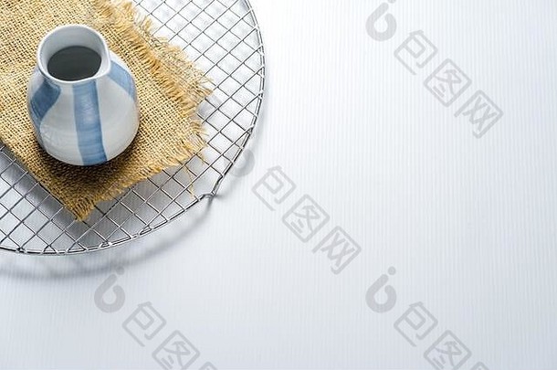 小陶瓷茶壶拍摄粗麻布基地蛋糕干燥机网