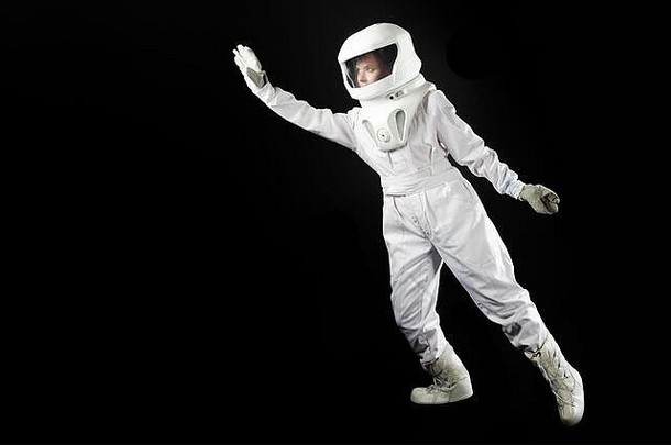 宇航员黑色的背景向前延伸手宇航员宇航服走向前延伸手