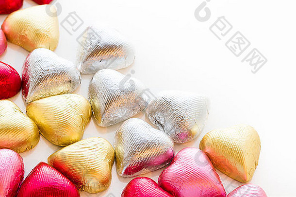 心形状巧克力糖果包装色彩斑斓的箔情人节一天