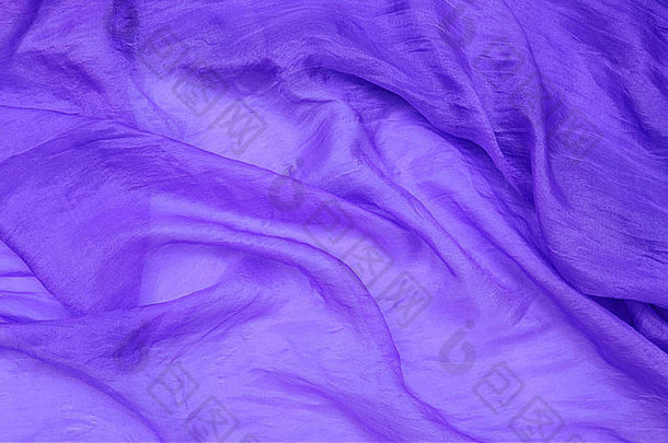 精致的紫色的丝绸雪纺褶皱背景