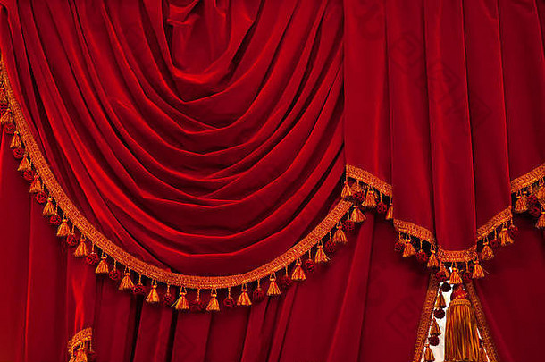 开放红色的窗帘闪闪发光的歌剧剧院背景