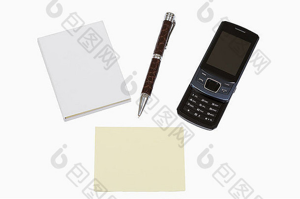 书笔移动电话孤立的白色背景