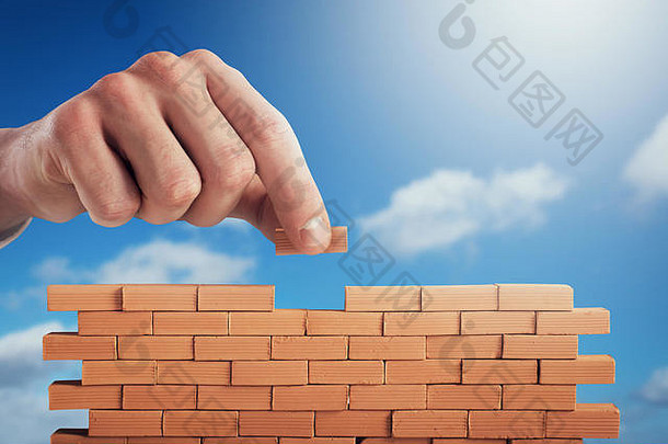 商人把砖构建墙概念业务伙伴关系集成<strong>启动</strong>