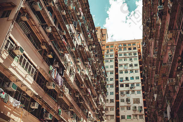 在香港香港城市体系结构背景巨大的块公寓墙古董程式化的照片色调修正过滤器