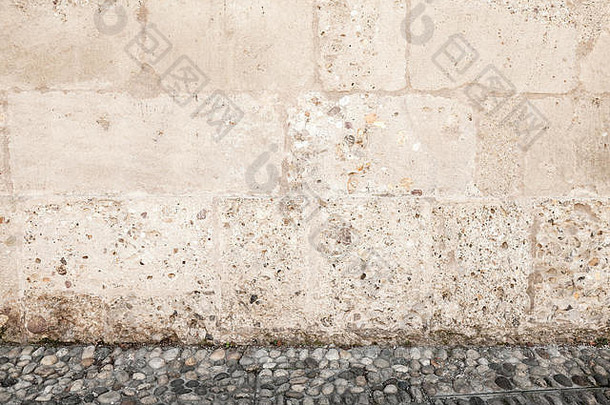 粗糙的石头墙鹅卵石地面空城市广场室内背景照片纹理