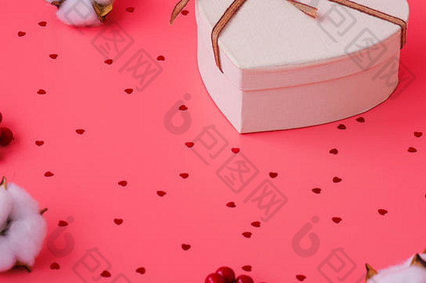 情人节一天背景礼物盒子黄金丝带灯粉红色的背景假期背景