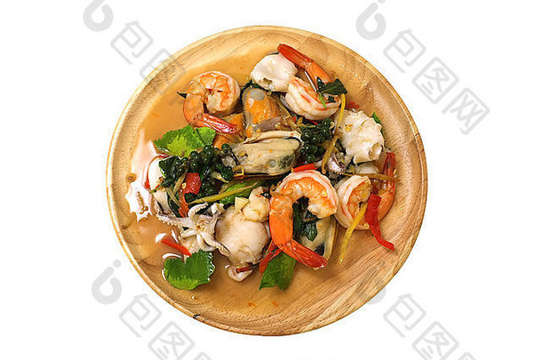 搅拌炸辣的海鲜混合草本植物泰国食物