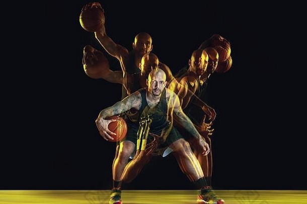 年轻的篮球球员团队运动服装培训练习行动运动孤立的黑暗背景霓虹灯选通脉冲光概念体育运动运动能源动态健康的生活方式