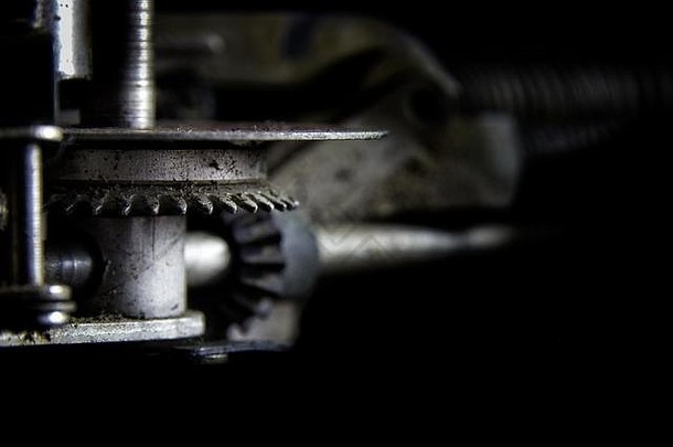 齿轮传动类型传动装置机制经典打字机散景褪了色的黑色的背景业务工业促销活动应用程序