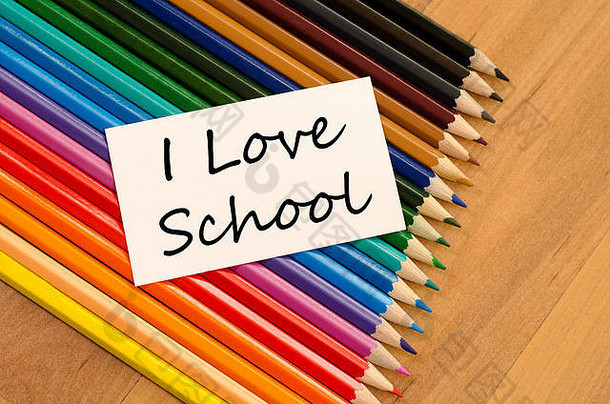 爱学校文本概念彩色的铅笔木背景