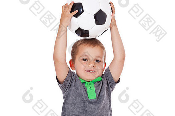 可爱的男孩玩足球球孤立的白色背景