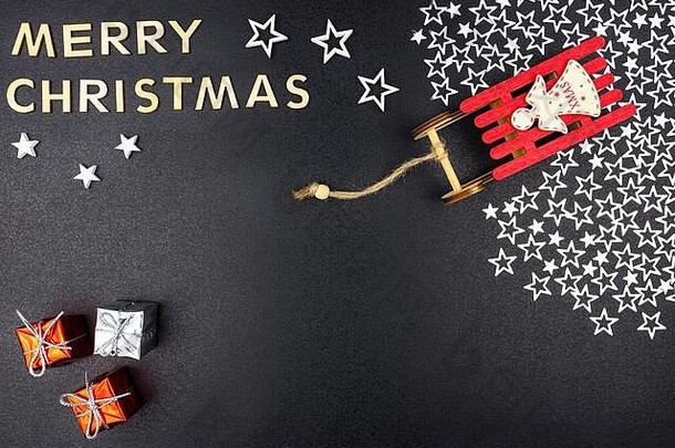 登记快乐圣诞节使木信说谎平孤立的黑色的背景可见红色的雪橇站银