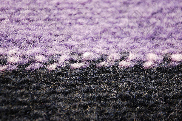 紫罗兰色的灰色的针织羊毛纹理宏细节背景水平
