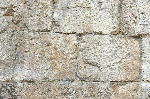 粗糙的石头墙使石头块合适的背景