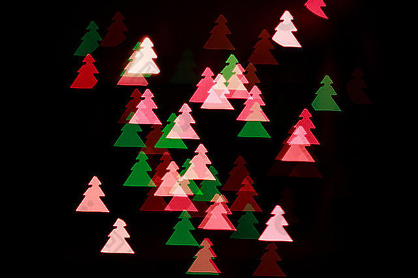 五彩缤纷的摘要背景灯形式圣诞节树焦点