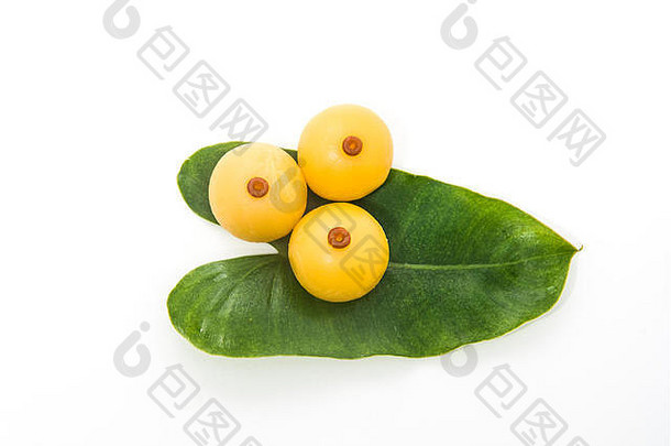 甜蜜的黄色的甜点皇家泰国厨房装饰绿色叶固体白色背景