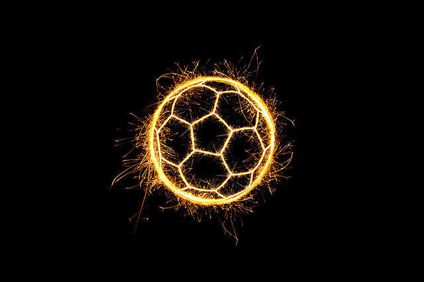 足球球使闪闪发光的灯孤立的黑色的背景足球背景